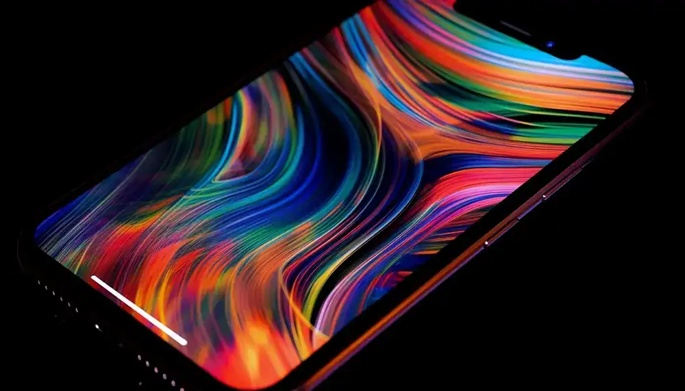 Tela de celular AMOLED com cores vibrantes e preto profundo em destaque. Smartphone Custo-benefício