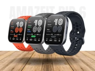 Amazfit Bip 6 em um fundo branco com pulseiras de cores diferentes.